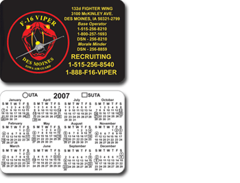 Black business card with squadron logo and contact information on front and schedule with marked dates on back.